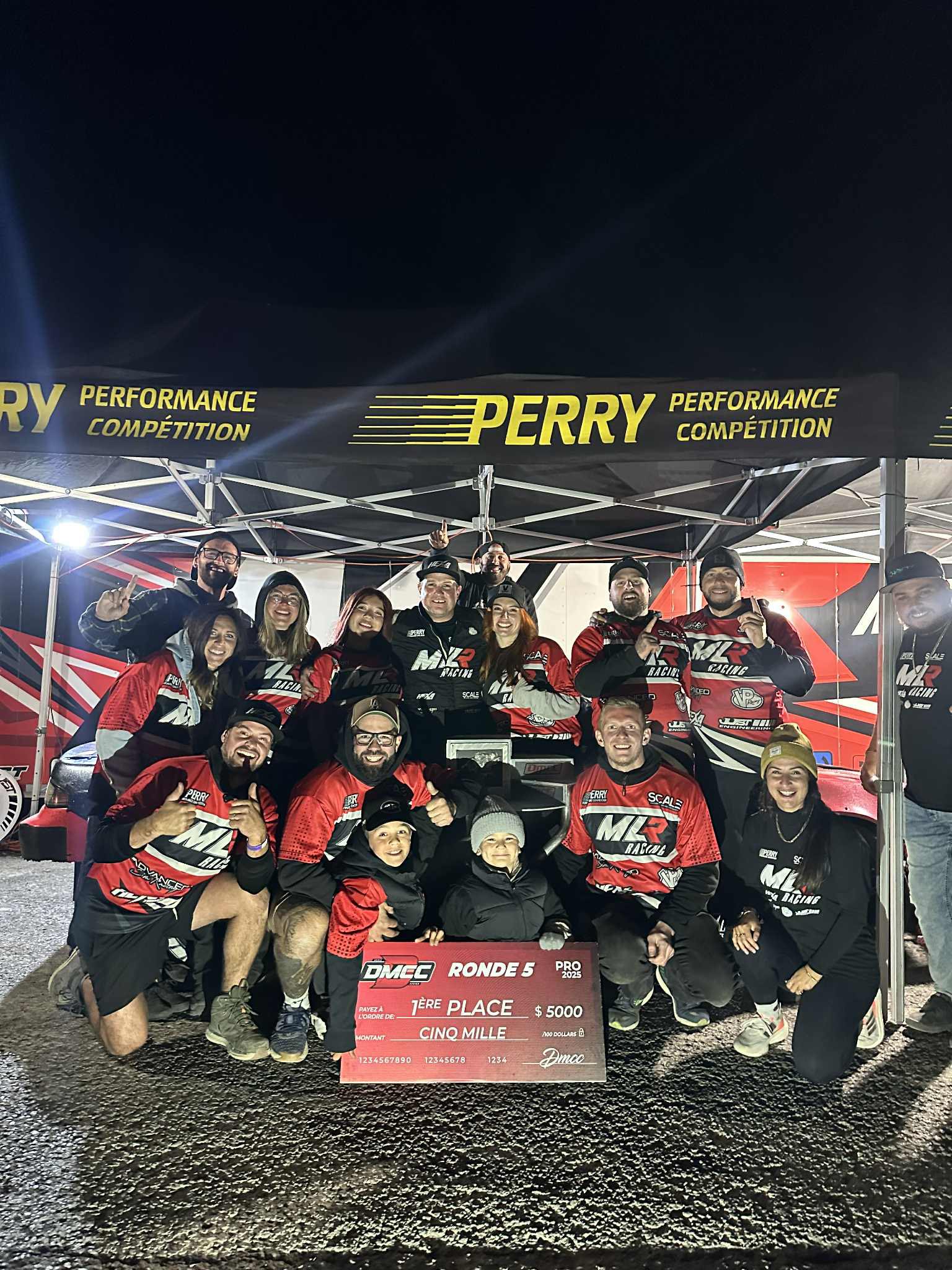 MLR Racing team celebrating a DMCC Round 5 first place result